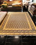 فرش دستباف آنتیک 90 ساله نقشه بوته جقه کرمان کد 24488