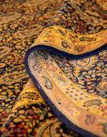 فرش دستباف آنتیک 90 ساله نقشه بوته جقه کرمان کد 24488
